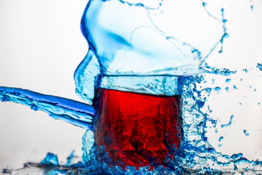 Blue Clear Glass Cup Splashed of Soda